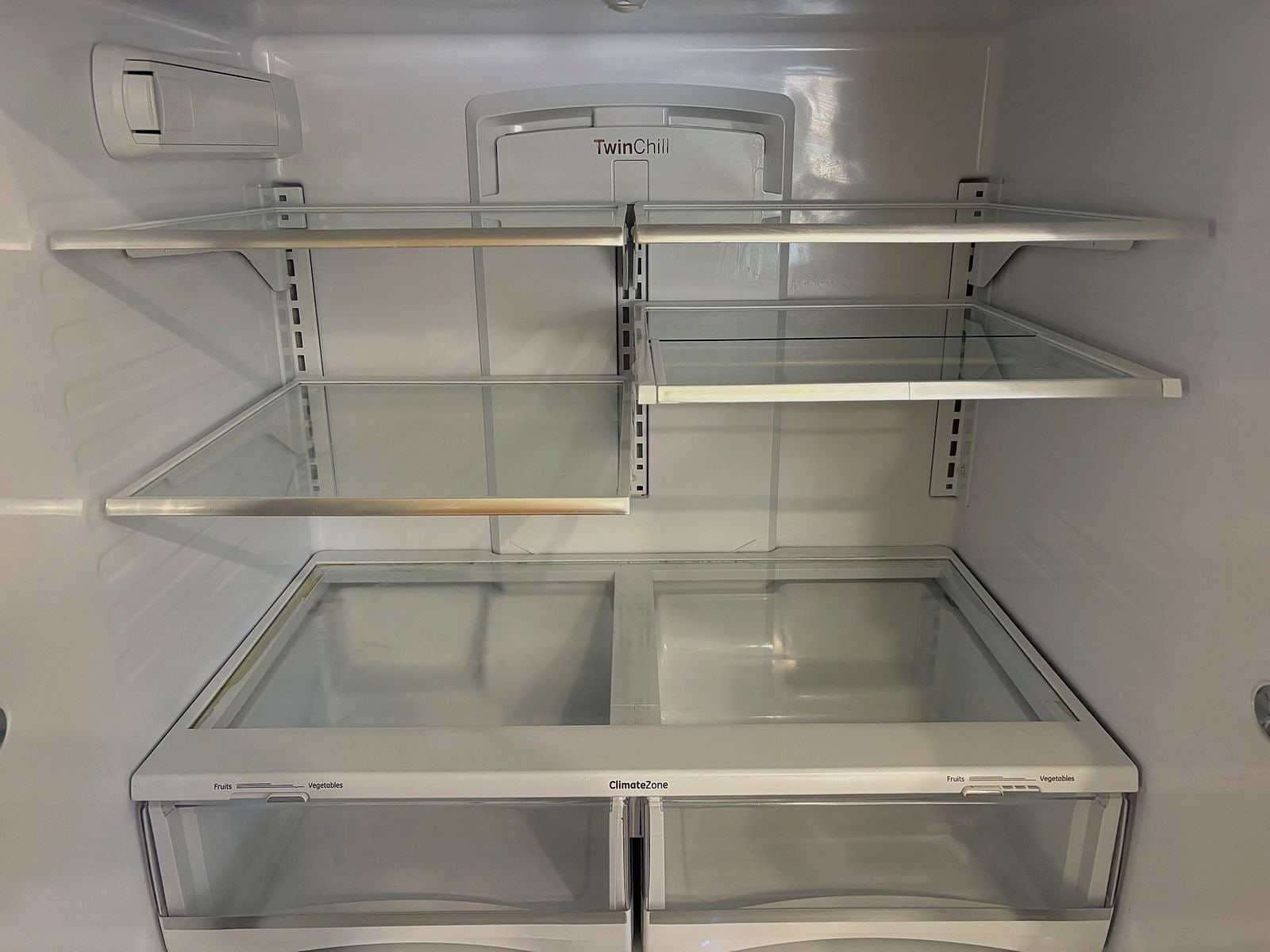 Same refrigerator interior spotless after our move-out clean