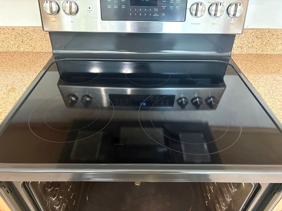 The same glass stovetop wiped streak-free after our clean