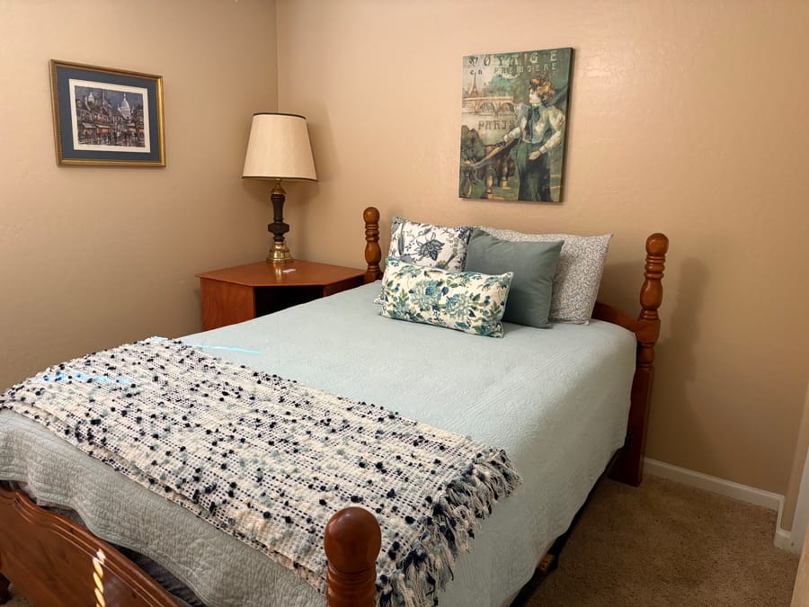 Cozy guest bedroom staged for the next Airbnb check-in
