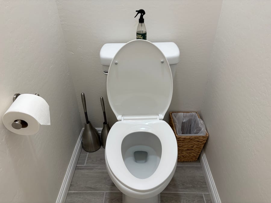 Bathroom scrubbed, disinfected, and staged after a move-out clean