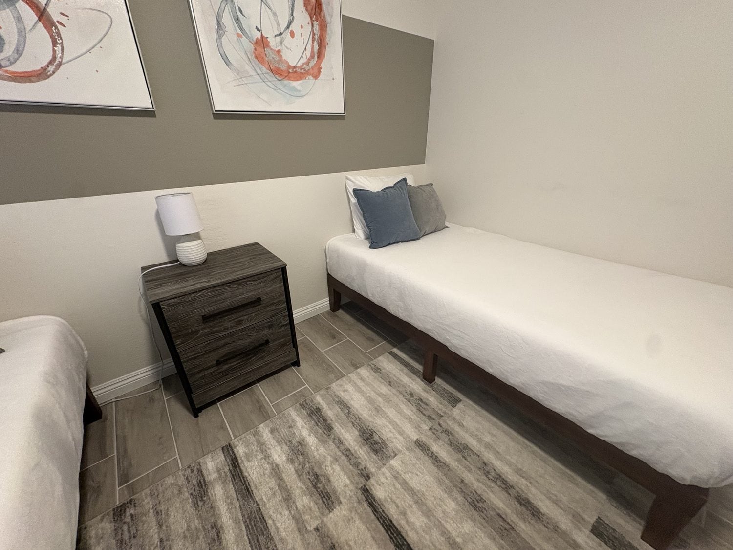 Twin-bed guest room reset and staged after a turnover clean